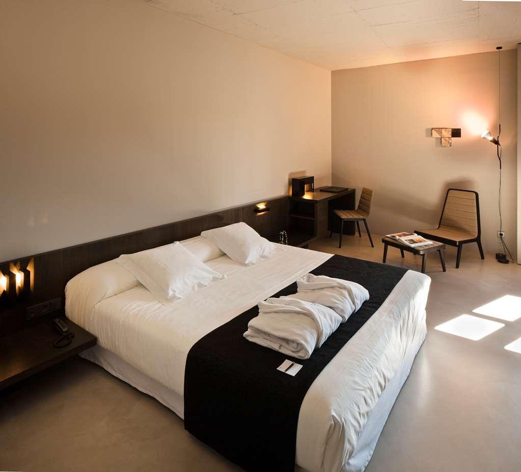 卡罗酒店 瓦伦西亚 客房 照片 A room at the hotel